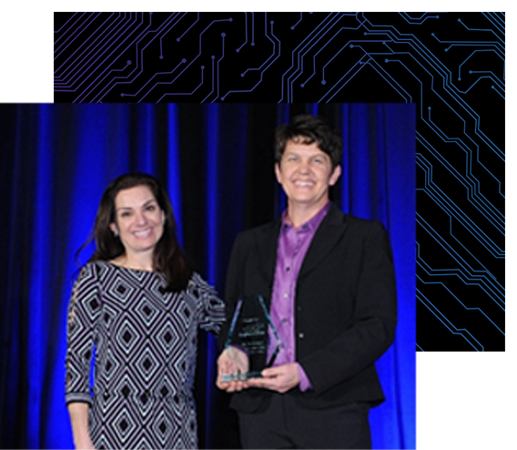 Heidi Barnes, 2017 Engineer of the Year,  accepted the award from Nina Brown, VP,  Events, amid great celebration from her  Keysight colleagues.