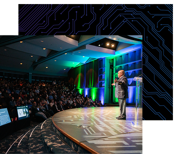 Keynoter on stage presenting to an audience