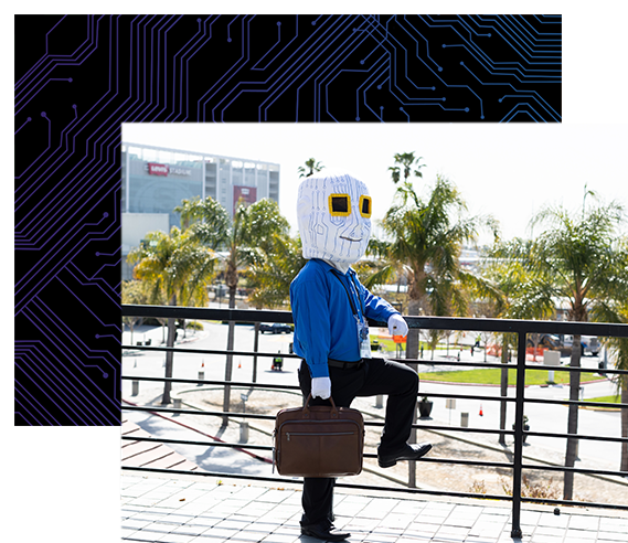 Chiphead mascot posing with briefcase outside the convention center