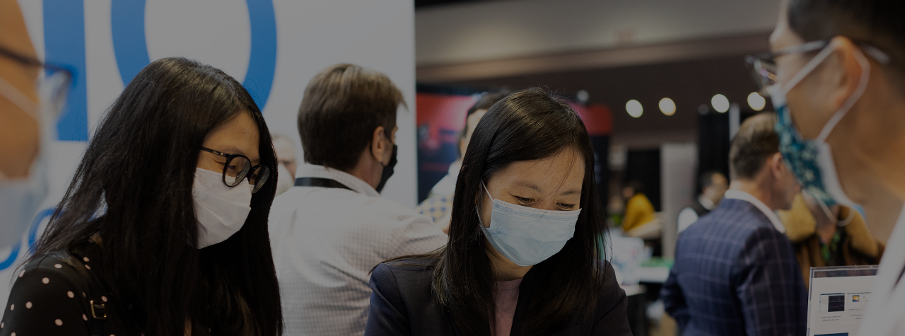 Attendees examine product in the expo hall